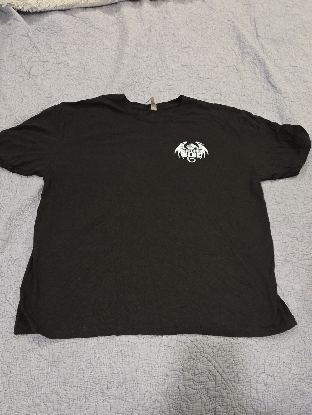 Next Level Apparel Black Short-Sleeve Tee with Small White Chest Graphic